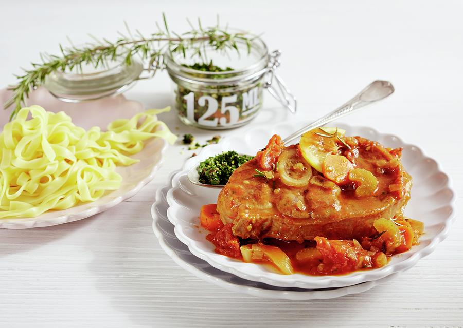 Ossobucco With Tagliatelle Photograph by Teubner Foodfoto