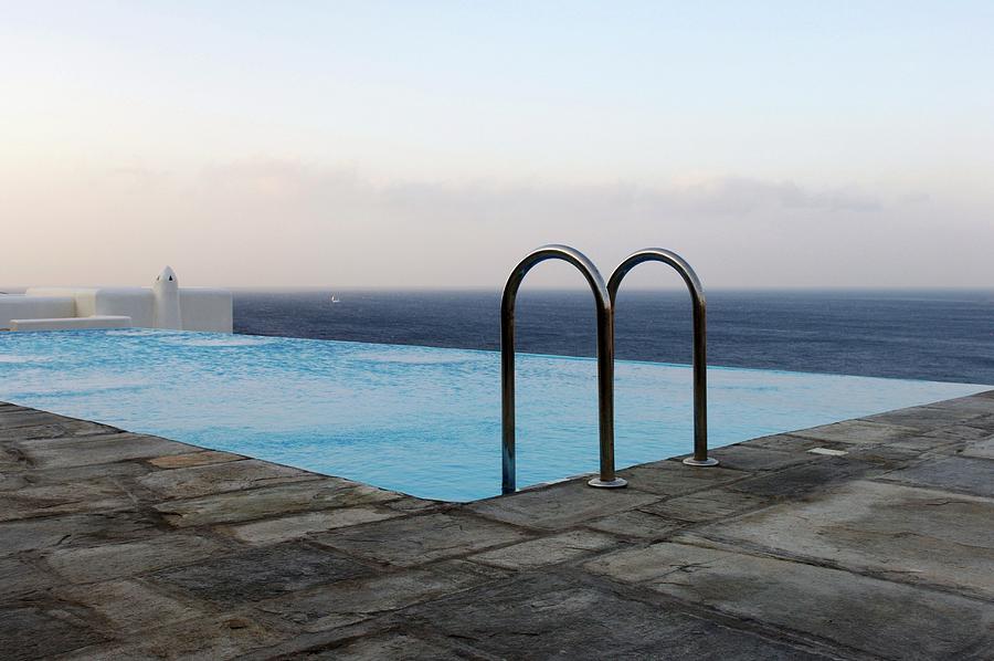 Outdoor Infinity Pool With Panoramic Ocean View Photograph by Twins