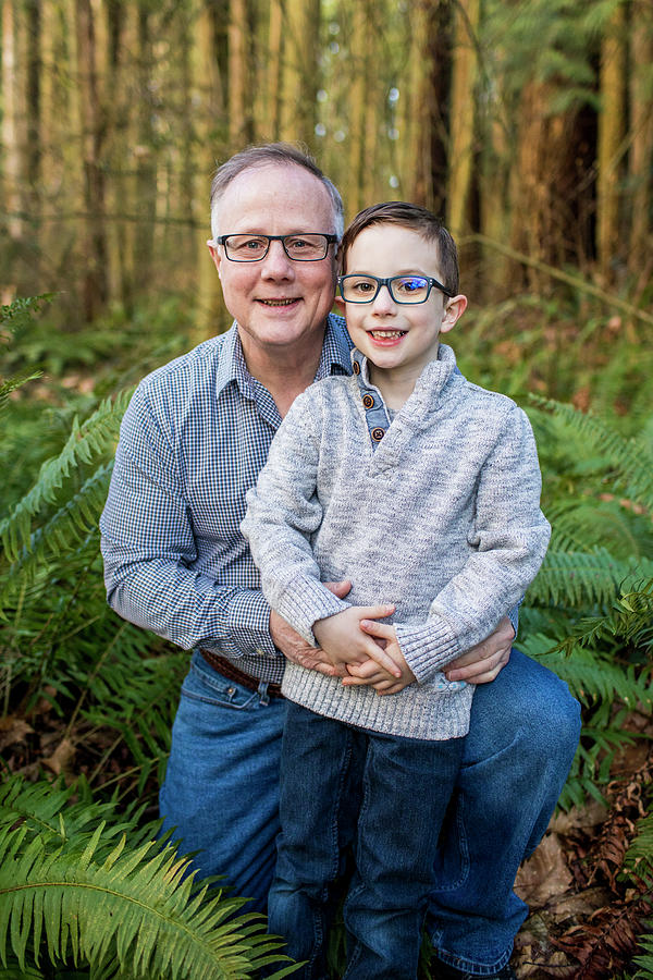 Nature Photograph - Outdoor Portrait Of Grandpa And Grandson. by Cavan Images