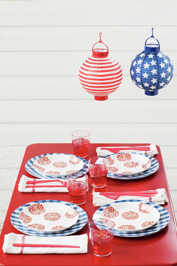 Outdoor Table Set For Fourth Of July Below Paper Lanterns usa Photograph by Tara Donne