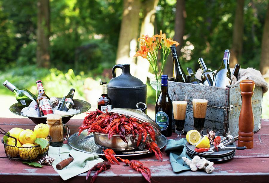 Outdoor Table With Crawfish And Beer Photograph by Yelena Strokin