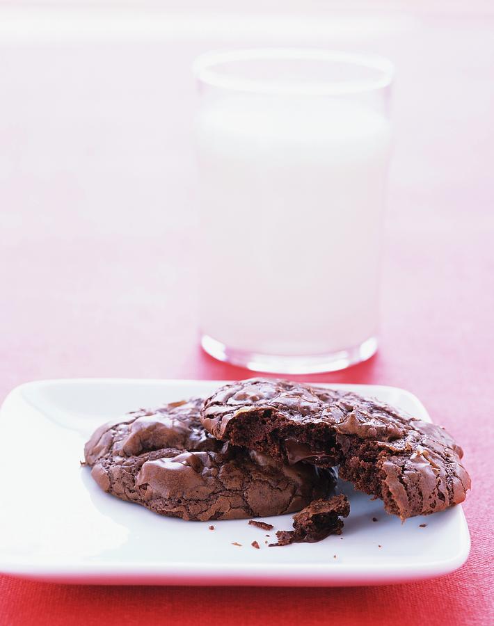 Outrageous Chocolate Cookies With Glass Of Milk Photograph by Clive Streeter