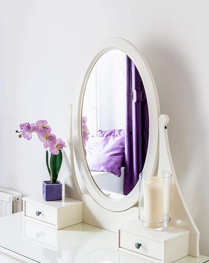 Oval Mirror On Dressing Table In Room With Purple Accents Photograph by Stuart Cox