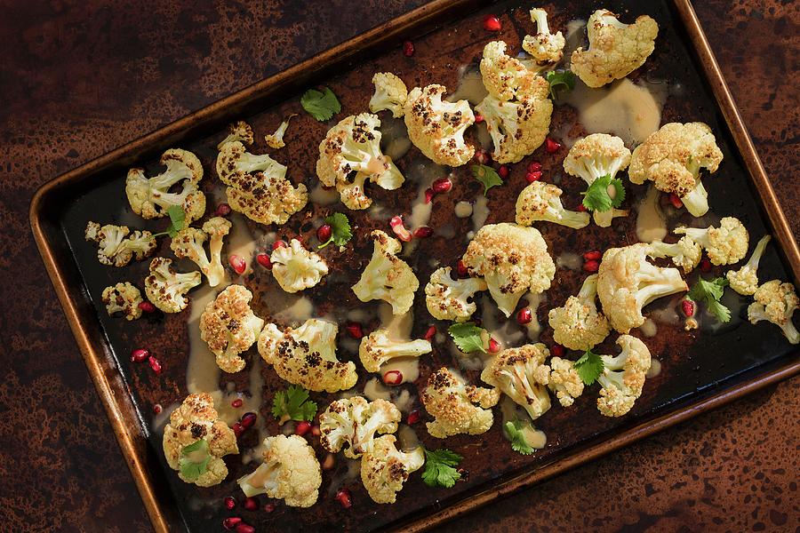 Oven-baked Cauliflower With Pineapple Seeds And Tahini Photograph by Colin Cooke