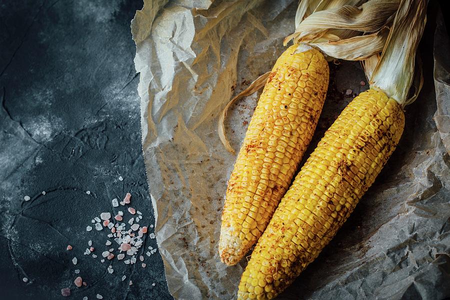 Oven Baked Corn On The Cob With Butter And Spices Photograph by Kate Prihodko