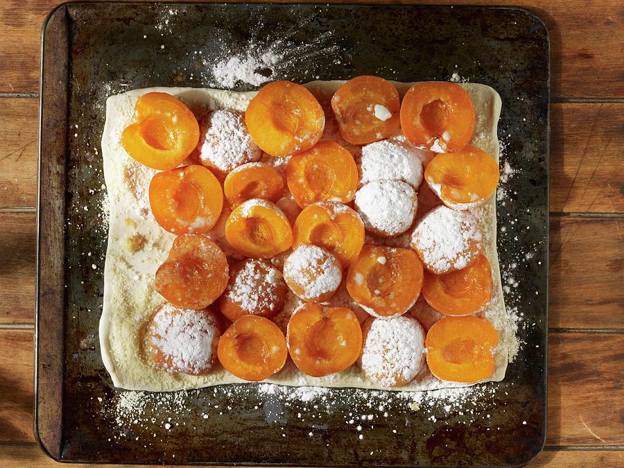 Oven-ready Apricot And Almond Tart Dusted With Icing Sugar Photograph by Atkinson / Sue Dr.