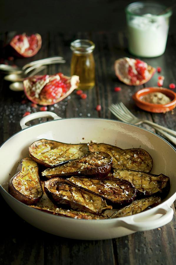 Oven-roasted Baby Aubergines Photograph by Kristy Snell