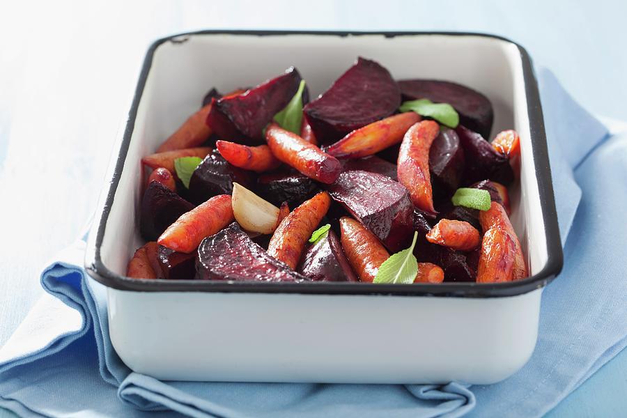 Ovenroasted Beetroot And Carrots With Sage And Garlic Photograph by