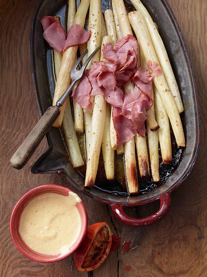 Oven-roasted Black Salsify With Anise And Blood Orange Hollandaise Sauce Photograph by Jan-peter Westermann