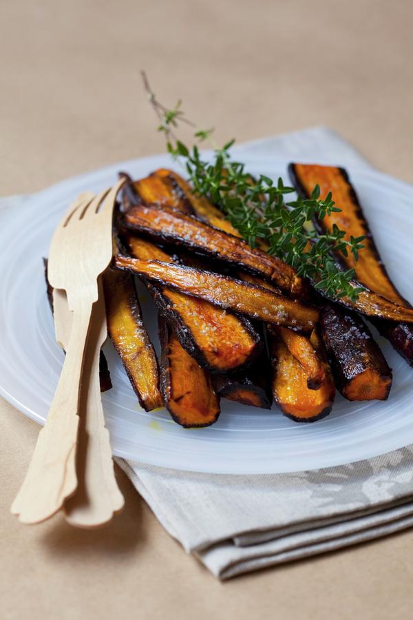 Oven-roasted Carrots With Thyme Photograph by Hilde Mche