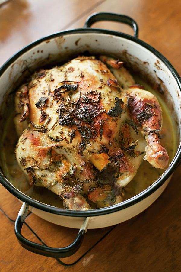 Oven Roasted Chicken With Herbs Photograph by Alex Hinchcliffe
