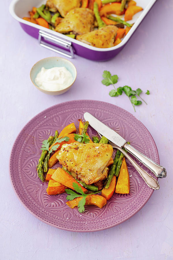Oven-roasted, Curried Chicken Legs With Pumpkin, Green Asparagus And Yogurt Photograph by Jan Wischnewski