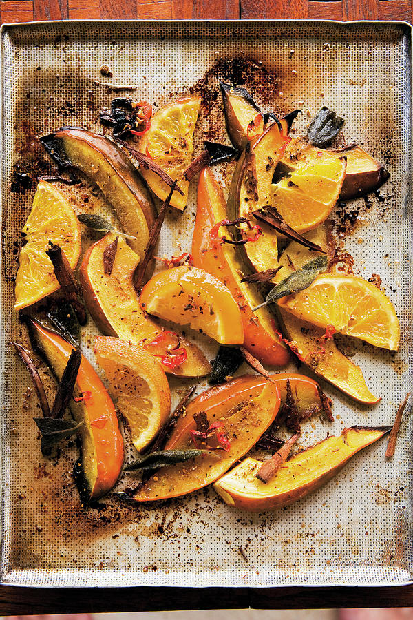 Oven-roasted Hokkaido Pumpkin With Cinnamon And Sage Photograph by Michael Wissing