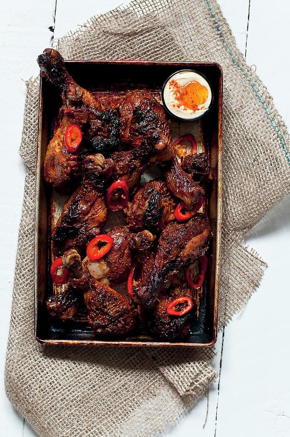 Oven-roasted Spicy Chicken Drumsticks Photograph by Tomasz Jakusz