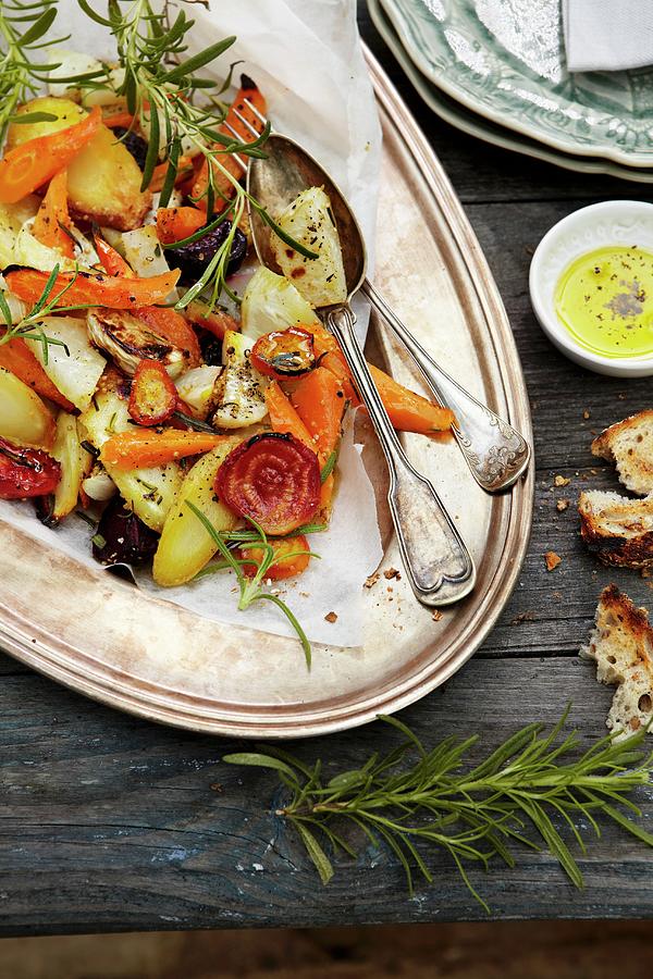 Oven-roasted Vegetables With Rosemary On A Silver Platter Photograph by Tine Guth Linse
