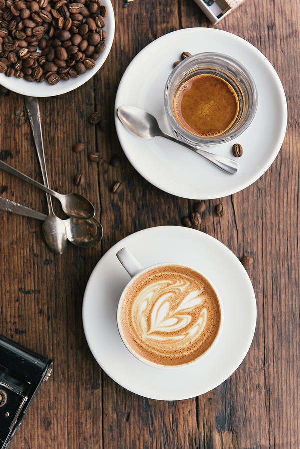 Overhead View Of Coffee's And Bowl Of Coffee Beans On Coffee Shop Table ...