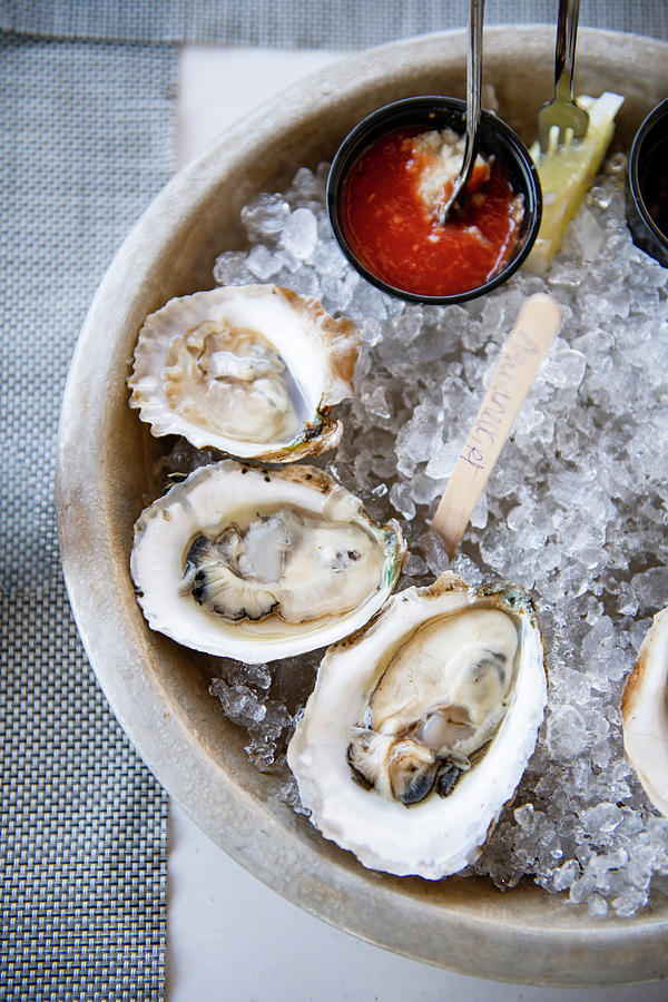 Oysters On The Half Shell Marked With Their Farm Location Photograph by ...