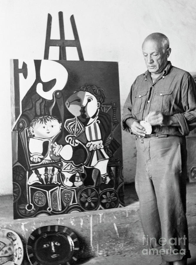 Pablo Picasso Posing With Painting Photograph by Bettmann