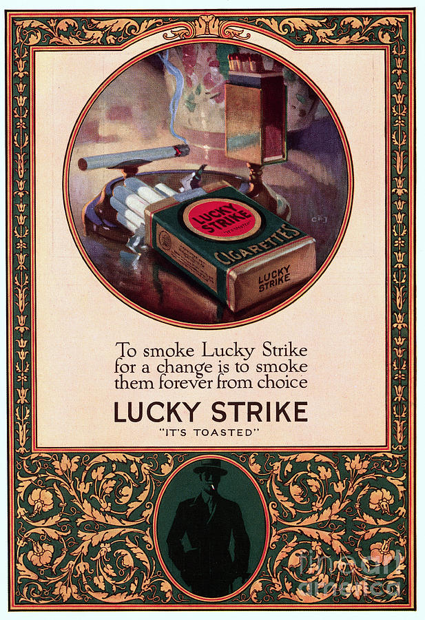 Pack Of And Lighted Lucky Strike Photograph by Bettmann