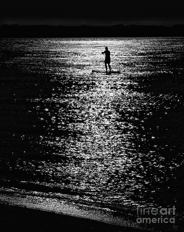 Paddleboarding In Silhouette Photograph by Jeff Breiman