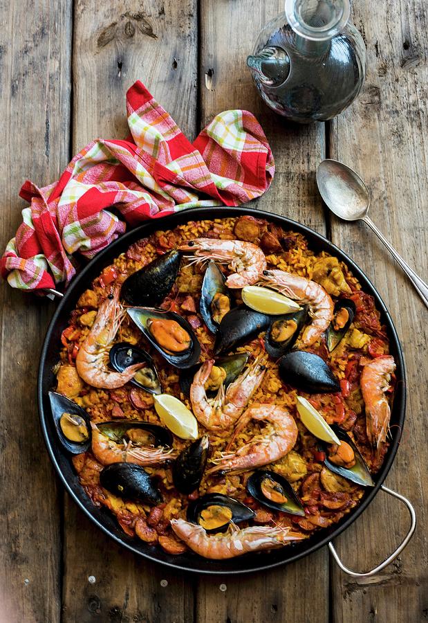 Paella With Prawns And Mussels Photograph by Hein Van Tonder