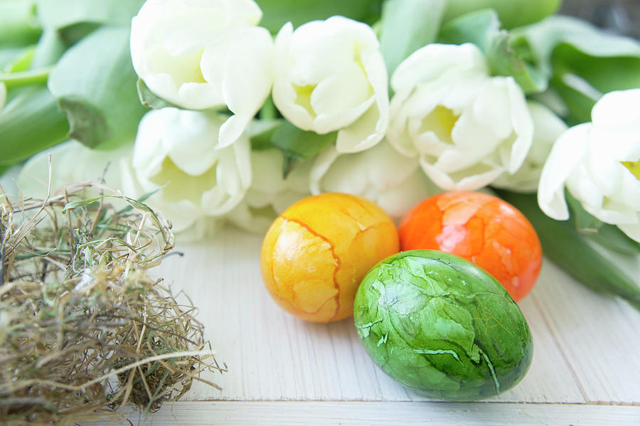 Painted Easter Eggs And White Tulips Photograph by Martina Schindler