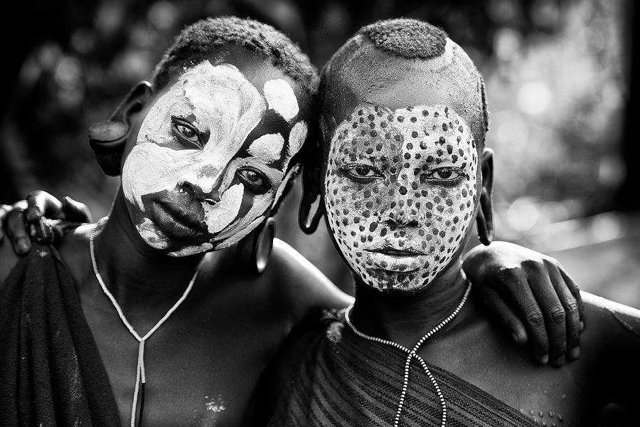 Painted Faces Photograph by Trevor Cole