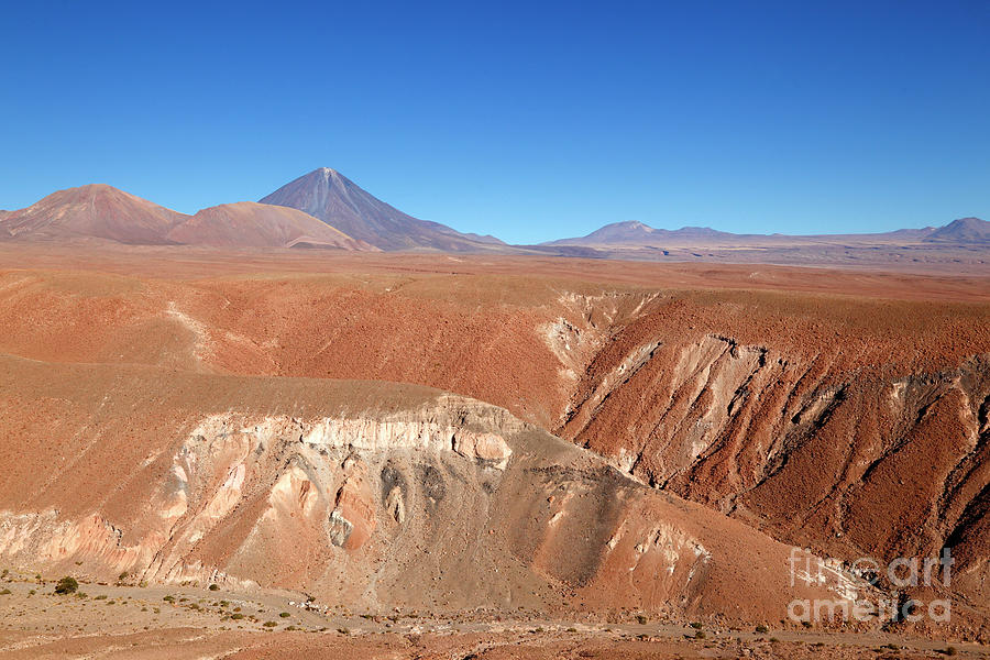 Painted Hills and Licancabur Volcano Chile Photograph by James Brunker