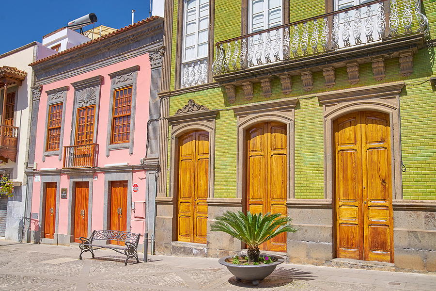 Painted Houses On The Main Street Photograph by Jan Wlodarczyk - Fine ...