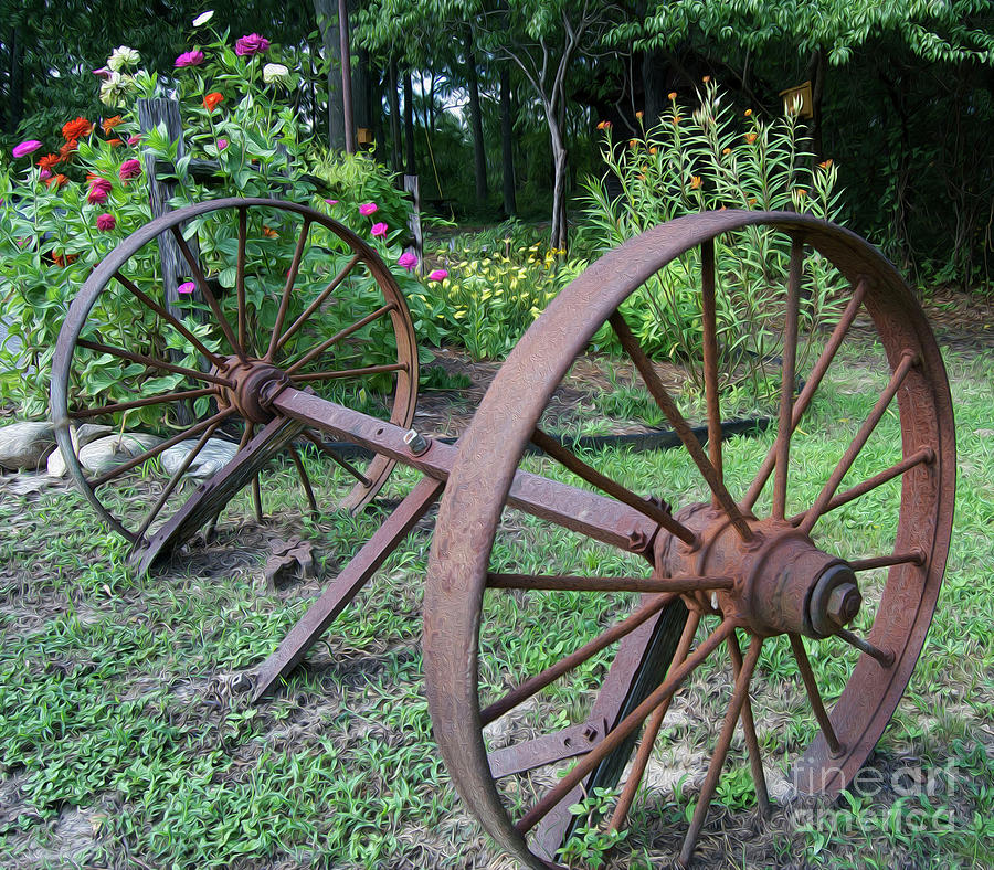 Abstract Photograph - Painted Wagon Wheels by Skip Willits