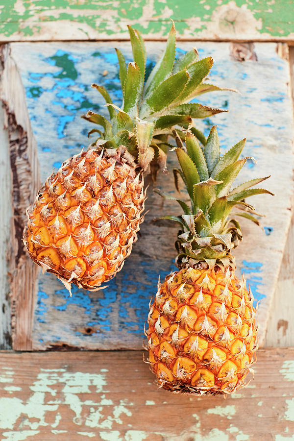 Pair Of Pineapples Photograph by Brigitte Sporrer