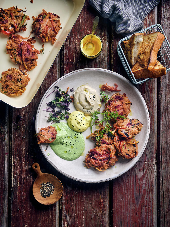 Pakoras Made From Peppers, Onions, Cabbage And Chickpea Flour With Dips Photograph by Angelika Grossmann