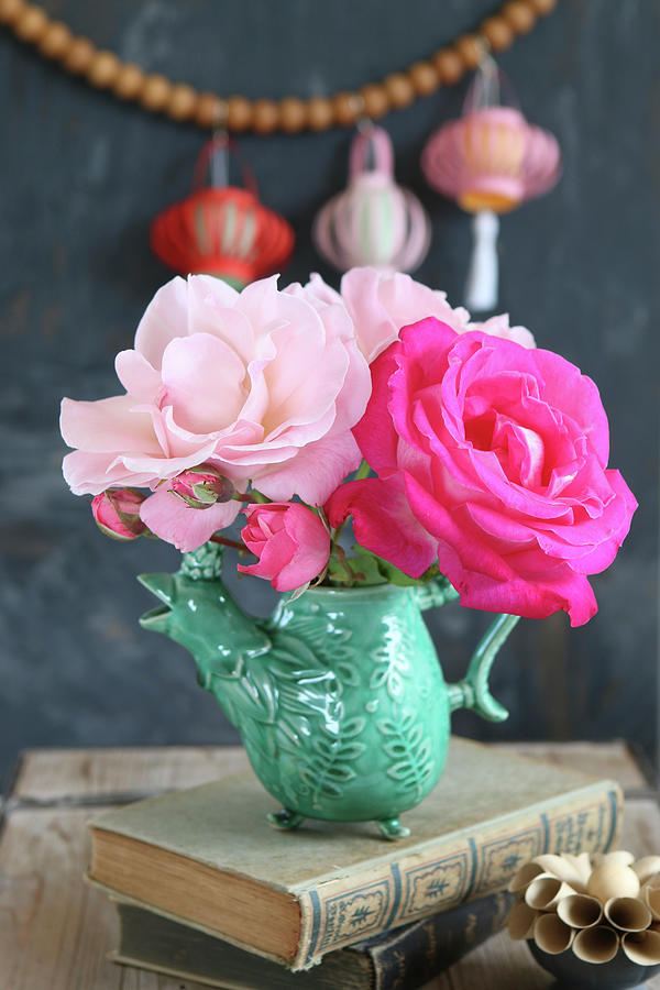 Pale And Deep Pink Roses In Bird-shaped Vase Photograph by Regina Hippel