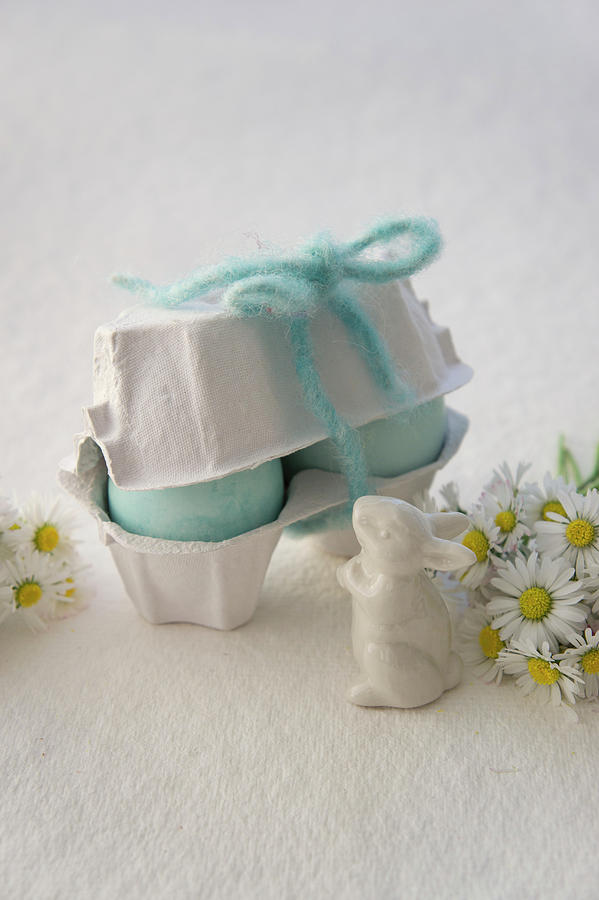 Pale Blue Easter Eggs In Egg Box, Easter Bunny And Daisies Photograph by Martina Schindler