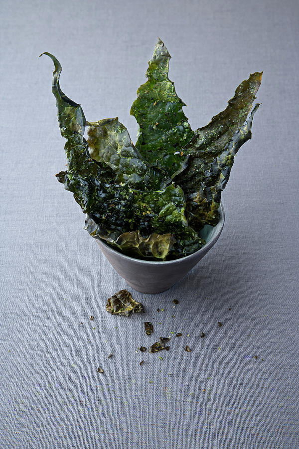 Palm Cabbage Chips With Seaweed And Tarragon Salt Photograph by Michael Wissing