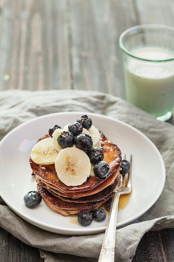 Pancake With Bananas And Blueberries Photograph by Susan Brooks-dammann