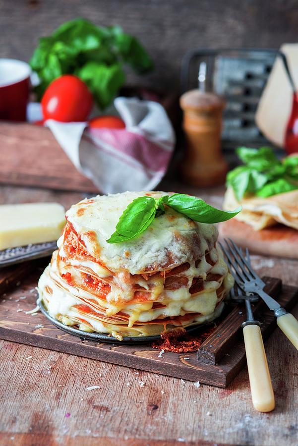 Pancakes Baked As Lasagna And Topped With Basil Photograph by Irina Meliukh