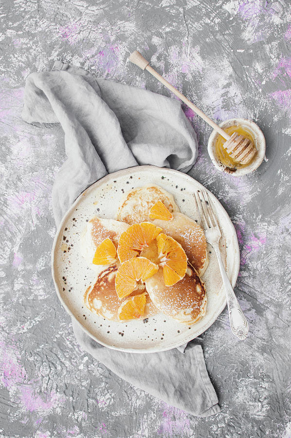 Pancakes Served With Oranges And Honey Photograph by Kachel Katarzyna