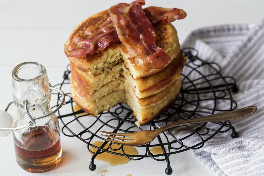 Pancakes With Bacon And Maple Syrup Photograph by Nicole Godt