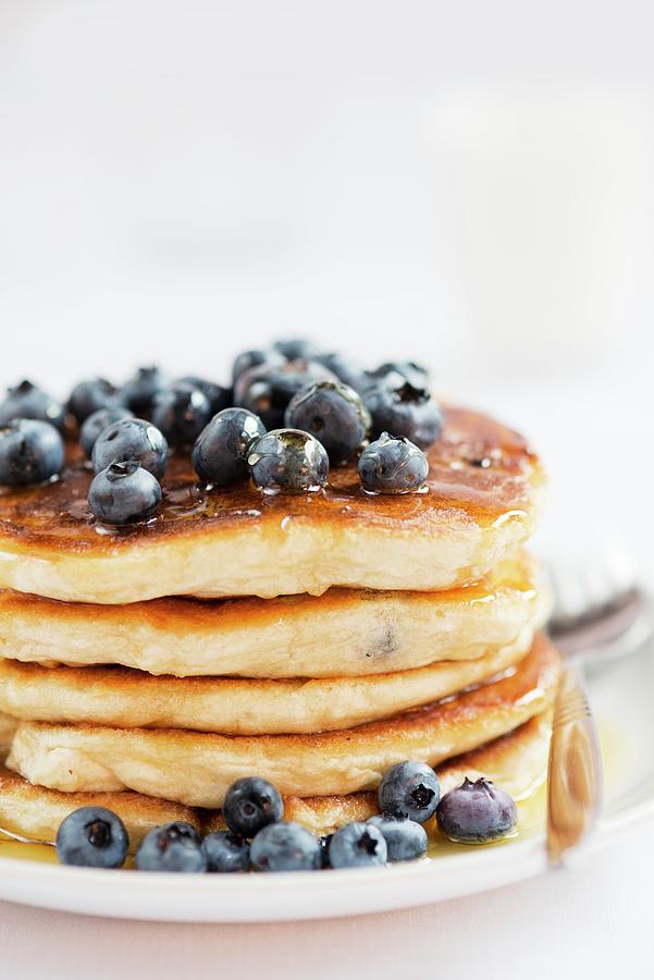 Pancakes With Blueberries And Honey Photograph by Ewa Rejmer