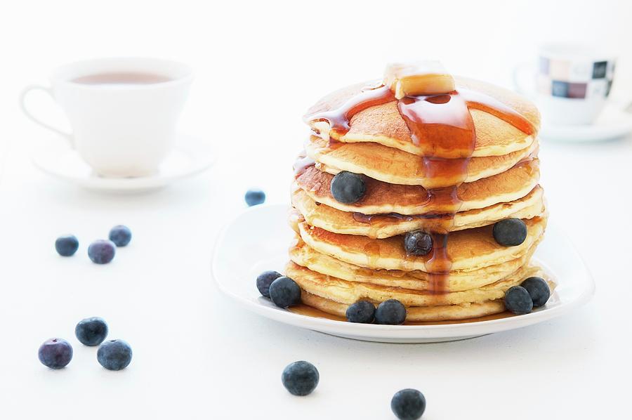 Pancakes With Maple Syrup And Blueberries Photograph by Paolo Lenzi