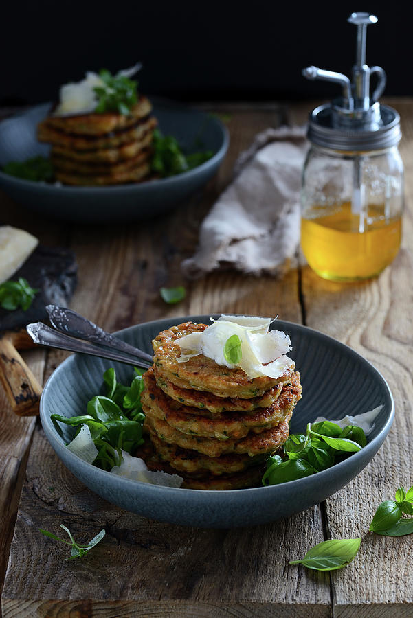 Pancakes With Spinach And Ricotta Served With Parmesan And Lambs Lettuce Photograph by Karolina Smyk