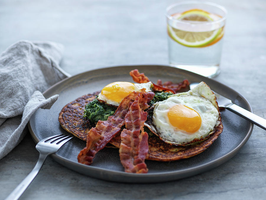 Pancakes With Spinach, Fried Egg And Bacon Photograph by Martin Dyrlv