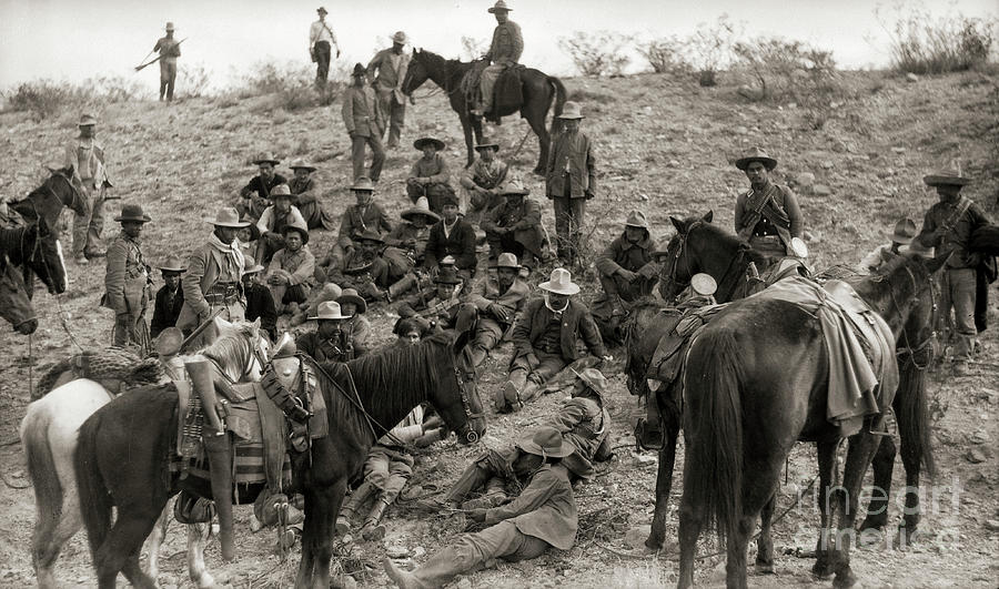 Pancho Villa And Troops Take Rest Photograph by Bettmann
