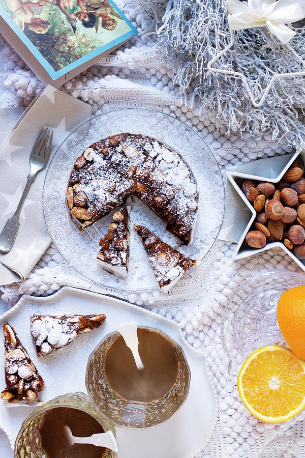 Panforte cake Made From Dried Fruit And Nuts, Italy Photograph by Marie Sjoberg
