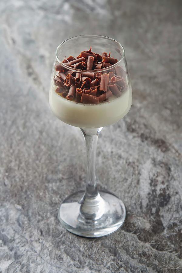 Panna Cotta With Chocolate Curls In A Dessert Glass Photograph by Naltik