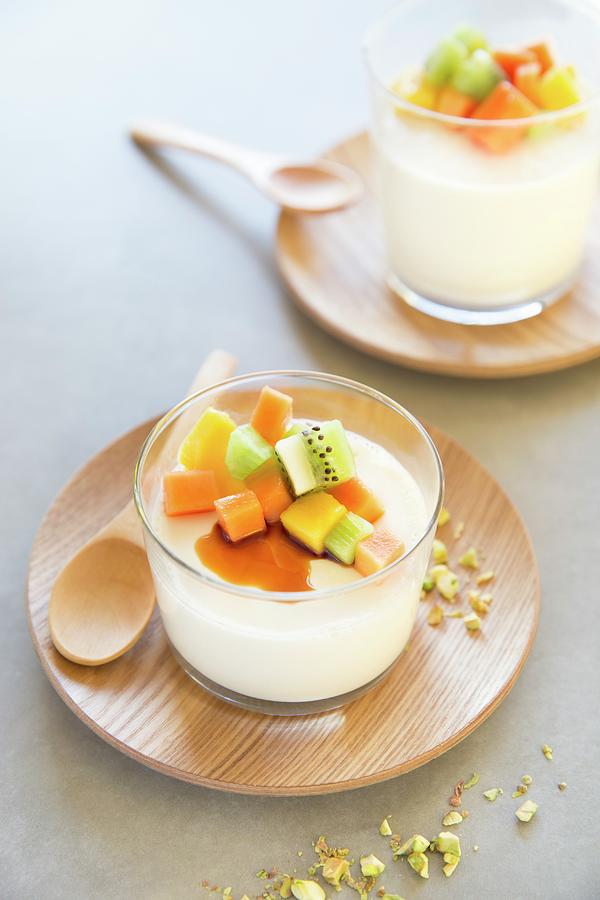 Panna Cotta With Exotic Fruits, Honey And Pistachios Photograph by Joana Leito