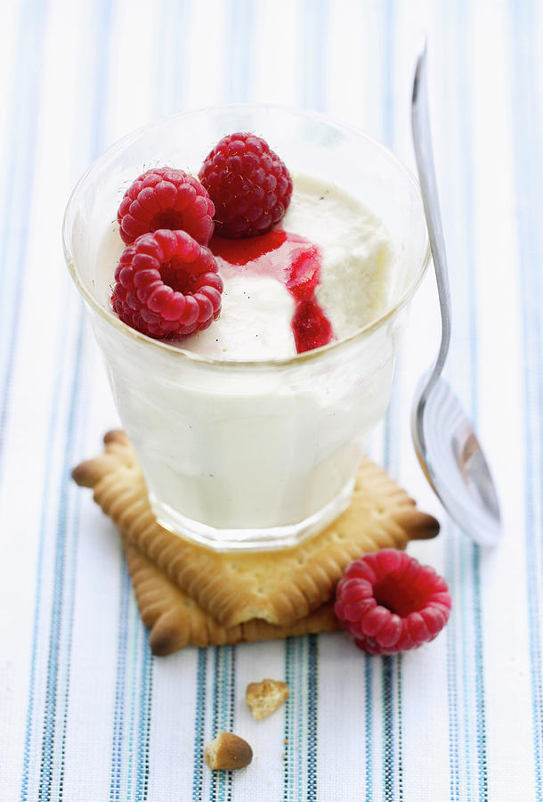 Panna Cotta With Raspberries Photograph by Radvaner