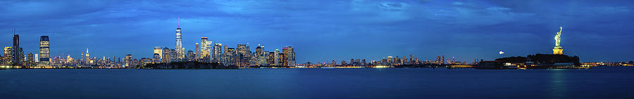 Panorama of New york city and liberty statue  Photograph by Anek Suwannaphoom