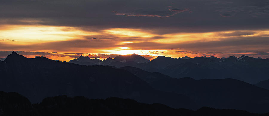 Panorama Of Sunrise Cresting Over High Peaks In Selkirks Photograph By 